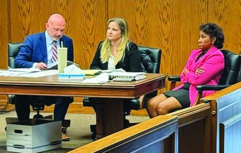 Dub Wagnon | Southwest Ledger Matina Davis, right, and her defense counselors listen to testimony during her trial June 13 on a charge of criminal slander in Comanche County District Court.