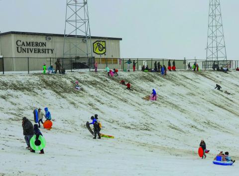 Bryanna Ramos | Southwest Ledger The 4 inches of snowfall that the National Weather Service recorded in Lawton on Jan. 9 made Cameron University a popular site for snow sledding.