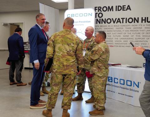 Ashley Payne | Southwest Ledger FISTA Director of Operations Bill Pearson visits with guests at the FIRES Symposium Wednesday at the FISTA Innovation Park..