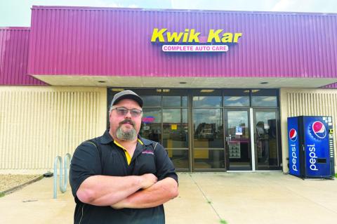 Bryana Ramos | Southwest Ledger Bobby Sorrells, shop manager of Kwik Kar Complete Auto Care on Fort Sill, stops for a photo before leaving for the day.