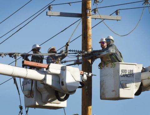 Public Service Co. of Oklahoma Public Service Co. of Oklahoma linemen work on power lines to restore service after a spring storm.