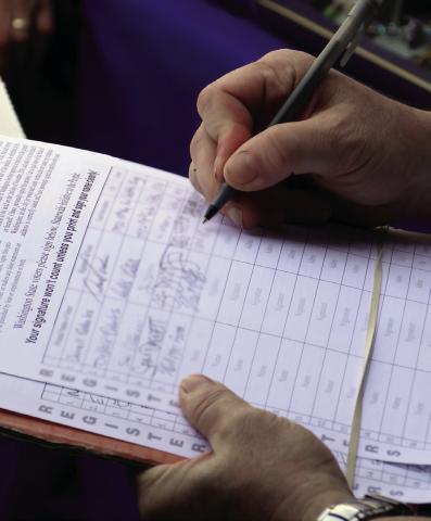 SIGNATURE COUNTDOWN: Supporters, critics ‘wait and see’ on minimum wage question